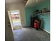 Spacious garage with ample storage and access to outdoor area at 2175 20Th Sw Ave, Largo, FL 33774