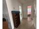 Hallway view with classic storage and doors leading to bathroom and bedroom at 2175 20Th Sw Ave, Largo, FL 33774