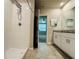 Bathroom featuring a tiled shower with a rain shower head at 219 Lovely Ct, Plant City, FL 33566