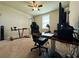 Bedroom setup as office space with a ceiling fan and a window with blinds at 219 Lovely Ct, Plant City, FL 33566