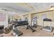 Bright community gym features weight training machines, free weights, and mirrored walls at 2400 Feather Sound Dr # 528, Clearwater, FL 33762