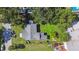 Aerial view of the property showcasing the layout, yard, and proximity to surrounding areas at 2607 N 59Th St, Tampa, FL 33619