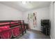 Bedroom featuring a bunk bed with pink curtains and a television stand at 2607 N 59Th St, Tampa, FL 33619