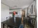 Inviting dining area featuring modern finishes, an adjacent kitchen, and lots of space to entertain Gathering and friends at 2607 N 59Th St, Tampa, FL 33619