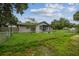Charming single-story home with a fenced yard and a cozy screened-in porch for relaxing outdoors at 2607 N 59Th St, Tampa, FL 33619