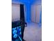 Stylish bedroom featuring LED lighting, gaming setup, and tiled floors at 2610 W Powhatan Ave, Tampa, FL 33614
