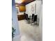 Kitchen dining area with stainless appliances, granite countertops, and modern furnishings at 2610 W Powhatan Ave, Tampa, FL 33614