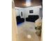 Inviting living room with tile floors, comfortable seating, and modern decor at 2610 W Powhatan Ave, Tampa, FL 33614