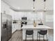 Modern kitchen featuring white cabinets and countertops with a large center island at 2809 N 21St St, Tampa, FL 33605