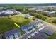 Aerial view of a townhome highlighting the landscaped backyard and parking at 3062 Victoria Inlet Dr, Holiday, FL 34691