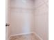 Walk-in closet with carpet and a shelf at 3062 Victoria Inlet Dr, Holiday, FL 34691