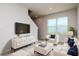Cozy living room with neutral palette, comfortable seating, and a large window for plenty of natural light at 3062 Victoria Inlet Dr, Holiday, FL 34691