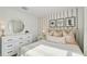 Charming bedroom with decorative accents, comfortable bedding, and ample natural light at 3071 Pink Gerbera Sq, Plant City, FL 33566