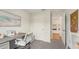 Bright home office featuring a desk, chair, modern decor, and easy access to other rooms at 3071 Pink Gerbera Sq, Plant City, FL 33566