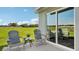 Relax on the back patio while enjoying a view of the lush green yard on a sunny day at 3071 Pink Gerbera Sq, Plant City, FL 33566