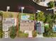 Aerial view highlighting the backyard with a pool, patio, and canal frontage with dock at 316 Hillpoint Dr, Palm Harbor, FL 34683
