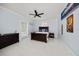 Cozy bedroom with a dark wood bed frame and unique decor at 316 Hillpoint Dr, Palm Harbor, FL 34683