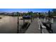 View of a private boat dock and waterfront at 316 Hillpoint Dr, Palm Harbor, FL 34683