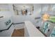 Bright foyer features a chandelier, staircase and open view at 316 Hillpoint Dr, Palm Harbor, FL 34683