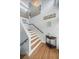 View of the staircase in the main hall of the home at 316 Hillpoint Dr, Palm Harbor, FL 34683