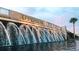 Epperson community entrance with cascading water feature at dusk at 32417 Welling Blade Loop, Wesley Chapel, FL 33545