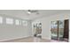 Bright, expansive bedroom featuring large windows and sliding door access to the patio at 3412 W San Juan St # A, Tampa, FL 33629