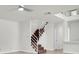 A view of the carpeted staircase with metal railings, located inside the home at 3412 W San Juan St # A, Tampa, FL 33629