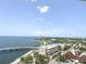 Expansive aerial view showcasing the bridge, bay, and cityscape on a bright, sunny day at 345 Bayshore Blvd # 1807, Tampa, FL 33606