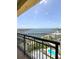 Enjoy this balcony view of water and a bright blue pool at 345 Bayshore Blvd # 1807, Tampa, FL 33606