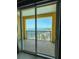 Condo view from inside, looking to an outdoor balcony and water views at 345 Bayshore Blvd # 1807, Tampa, FL 33606