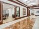 Hallway featuring marble floors, decorative trim, and artful decor at 345 Bayshore Blvd # 1807, Tampa, FL 33606