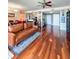 Bright living room with hardwood floors, open floor plan, comfortable seating and open access to the kitchen at 345 Bayshore Blvd # 1807, Tampa, FL 33606