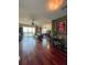 Bright living room with hardwood floors, balcony access, and comfortable seating at 345 Bayshore Blvd # 1807, Tampa, FL 33606