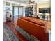 Stylish living room featuring hardwood floors, comfortable sofa, and wall shelving for storage and display at 345 Bayshore Blvd # 1807, Tampa, FL 33606