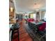 Spacious open layout featuring a kitchen with bar seating, dining area and living room with hardwood floors at 345 Bayshore Blvd # 1807, Tampa, FL 33606