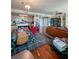 Open floorplan showcasing kitchen with bar seating, dining area, and living room with hardwood floors at 345 Bayshore Blvd # 1807, Tampa, FL 33606