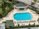 Aerial view of pool and lounge area with chairs and palm trees at 345 Bayshore Blvd # 1807, Tampa, FL 33606