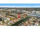 Waterfront property on a canal featuring a private dock and lush tropical landscaping at 3830 46Th S Ave, St Petersburg, FL 33711