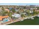 Waterfront home on a canal with a dock, lanai, and lush landscaping at 3830 46Th S Ave, St Petersburg, FL 33711