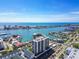 Scenic aerial view of the waterfront community with easy access to the ocean at 400 Island Way # 502, Clearwater Beach, FL 33767