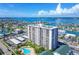 Aerial view of condominium near the intercoastal with private balconies, pool and parking at 400 Island Way # 502, Clearwater Beach, FL 33767