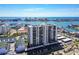Expansive aerial shot showcases a condo with ocean views, parking and nearby homes at 400 Island Way # 502, Clearwater Beach, FL 33767
