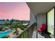Relaxing balcony with comfortable seating and beautiful water view at 400 Island Way # 502, Clearwater Beach, FL 33767