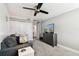 Cozy bedroom featuring neutral decor, updated lighting, and ample closet space at 400 Island Way # 502, Clearwater Beach, FL 33767