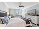 This cozy bedroom has a large window offering picturesque views to compliment the modern decor at 400 Island Way # 502, Clearwater Beach, FL 33767