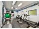 Well-equipped fitness center with treadmills, elliptical and free weights at 400 Island Way # 502, Clearwater Beach, FL 33767
