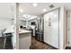 Updated kitchen with stainless steel appliances, gray cabinets, and breakfast bar at 400 Island Way # 502, Clearwater Beach, FL 33767