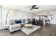 Cozy living room featuring a sectional sofa, area rug, and an open layout at 400 Island Way # 502, Clearwater Beach, FL 33767