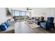 Inviting living room with a large balcony, offering great city views and ample seating at 400 Island Way # 502, Clearwater Beach, FL 33767