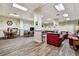 Spacious recreation room features multiple seating areas for games, TV and socializing at 400 Island Way # 502, Clearwater Beach, FL 33767